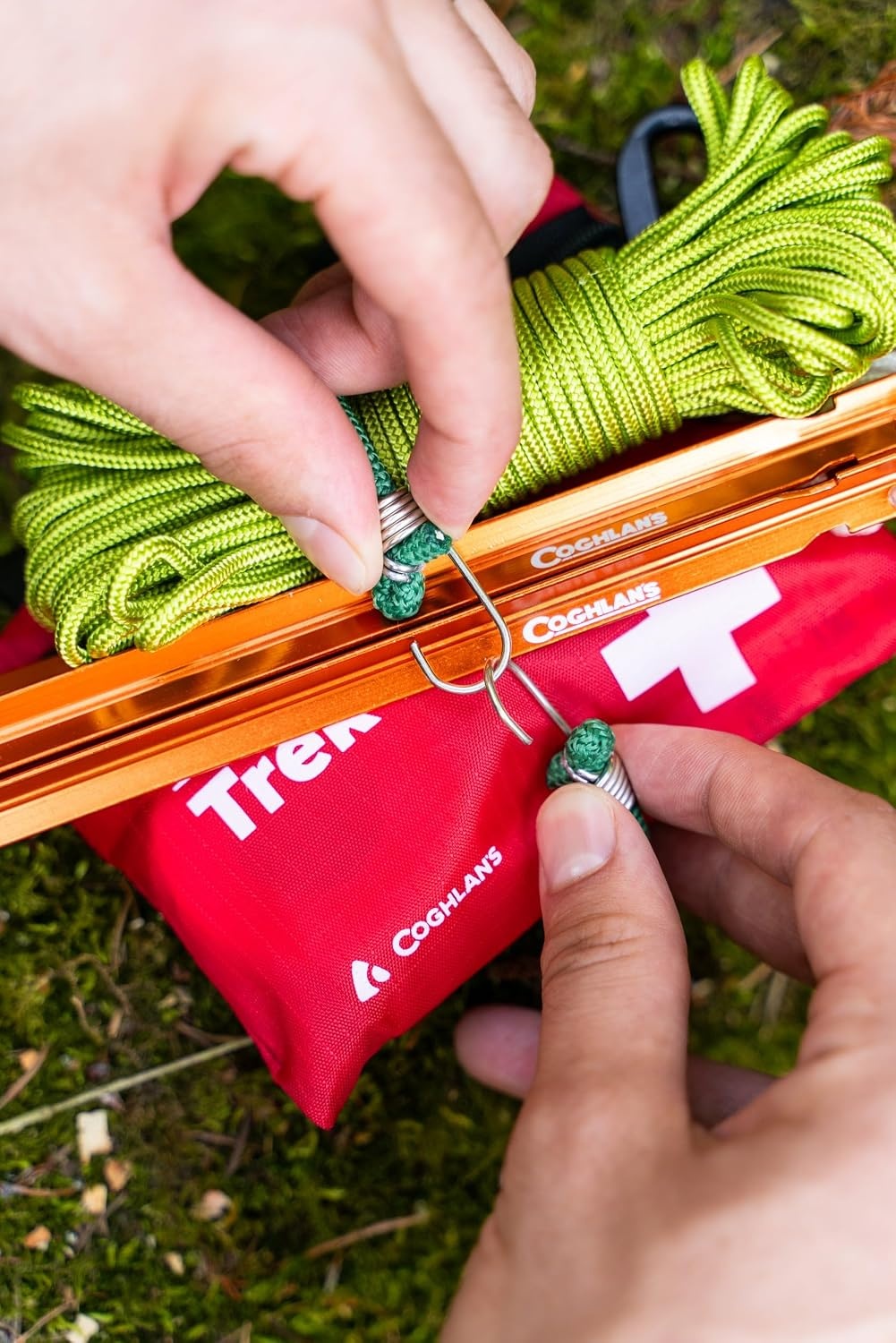 image:imageCoghlans Mini 10Inch Bungee Cords with Hardened Steel Hooks 4Pack Durable Elastic Straps with MultiStrand Rubber Core for Securing Tarps Gear and Everyday Use